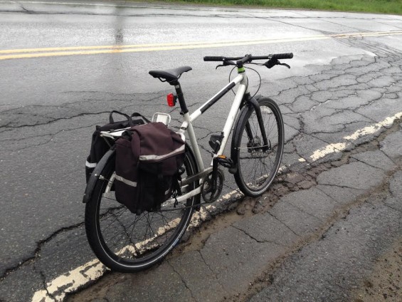 The Seek 1 with fenders, rack and loaded for  my morning commute. (Note the wonderful pavement on Vt Rt 122)